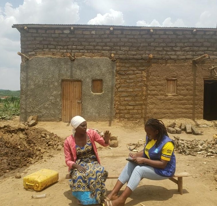 Photo label: A woman in Uganda shares her journey of rebuilding her life in a new country.